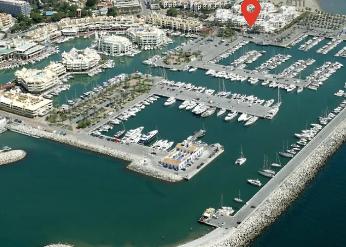 Holiday Rental Apartment Located In Puerto Marina With Sea Views, First Line Of Beach.
