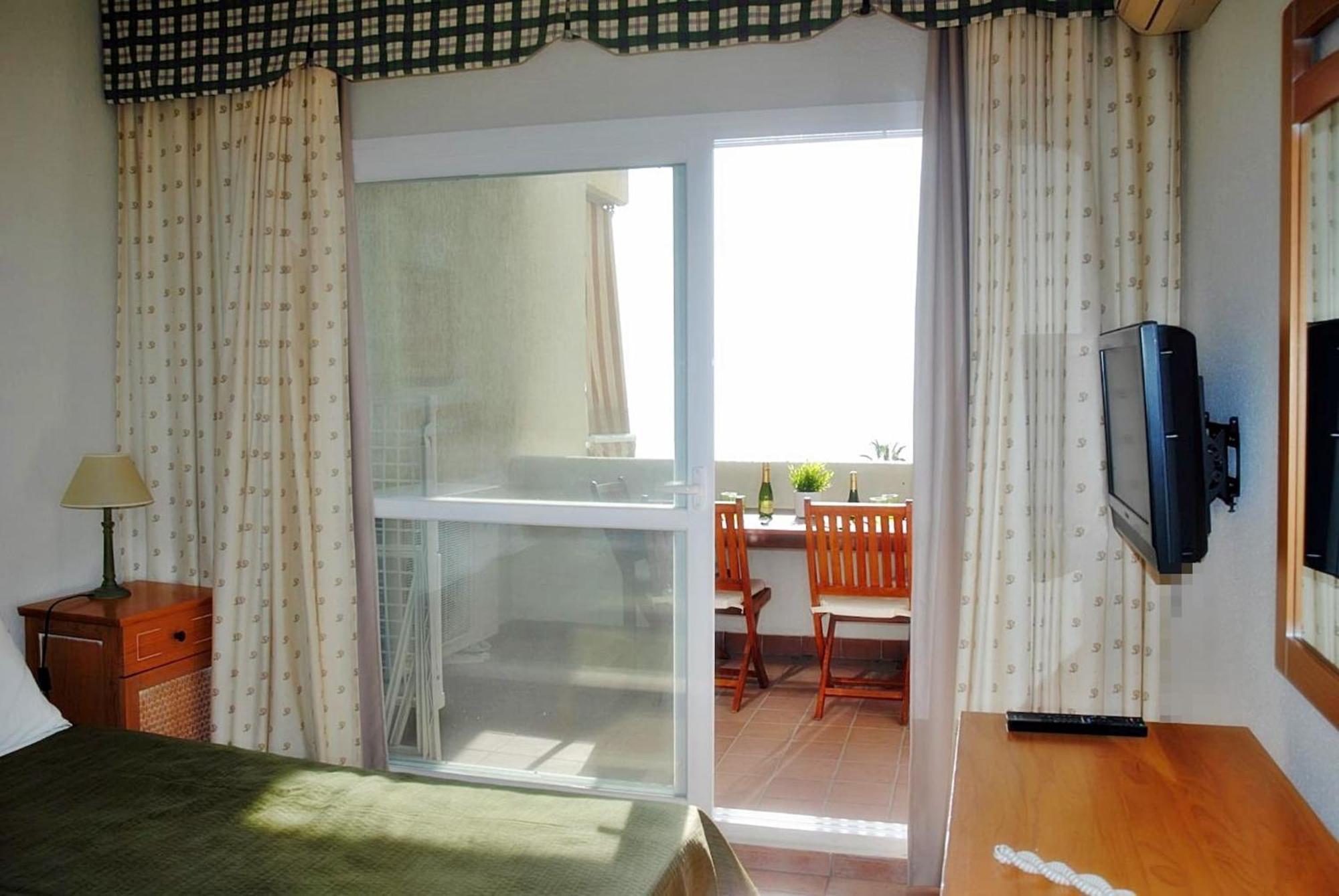 Beachfront In Benalbeach