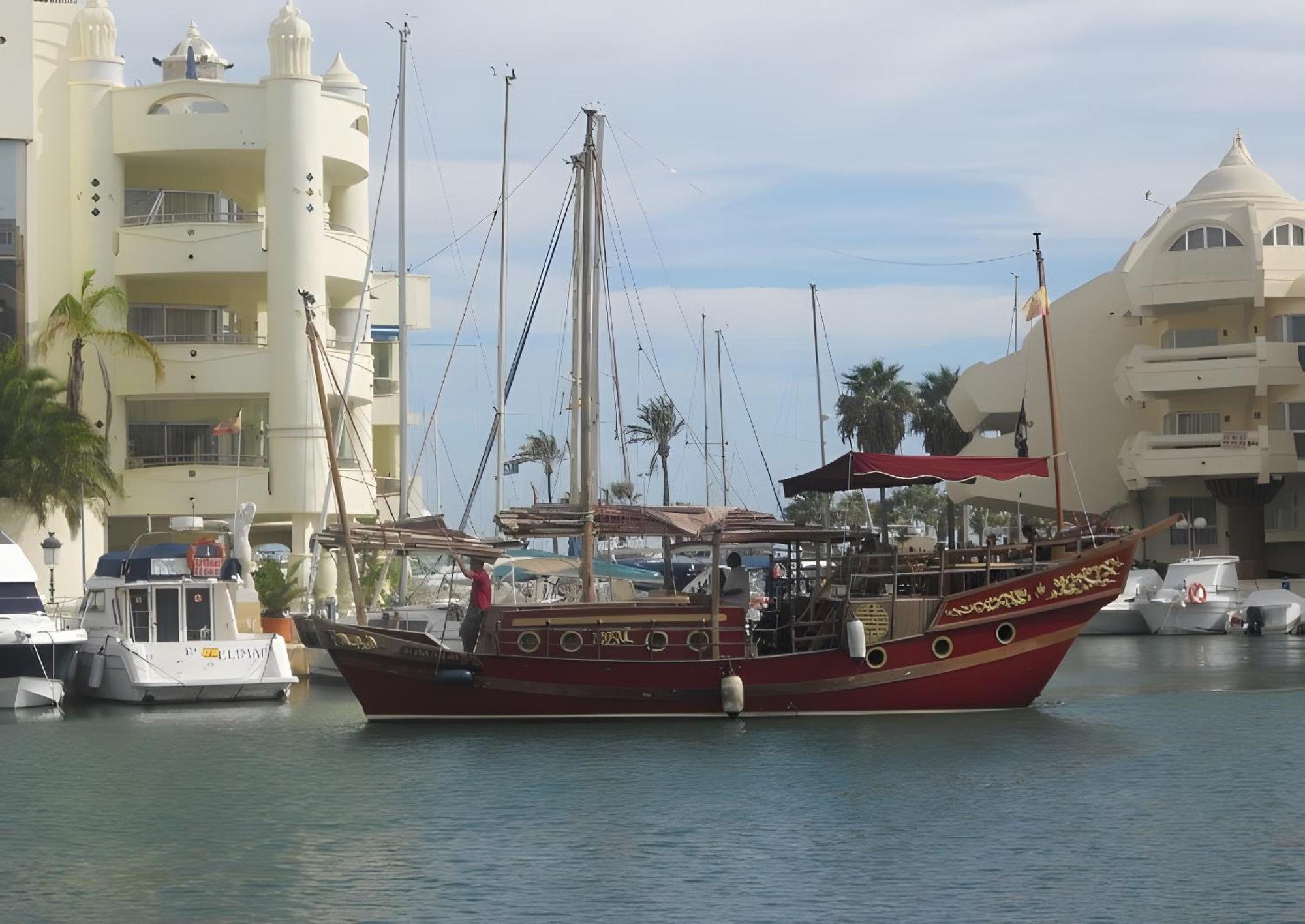 Next To Puerto Marina And The *